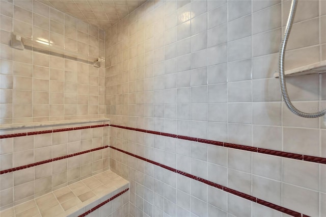 bathroom featuring tiled shower