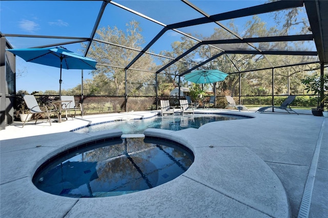 view of swimming pool featuring a pool with connected hot tub, a lanai, and a patio