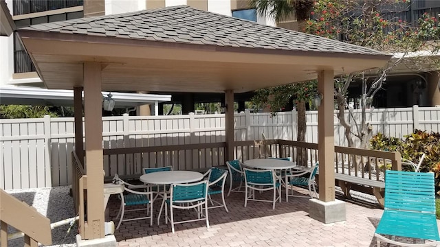 view of patio / terrace featuring outdoor dining area and a fenced backyard