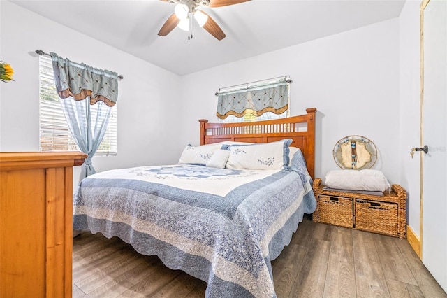 bedroom featuring ceiling fan and wood finished floors