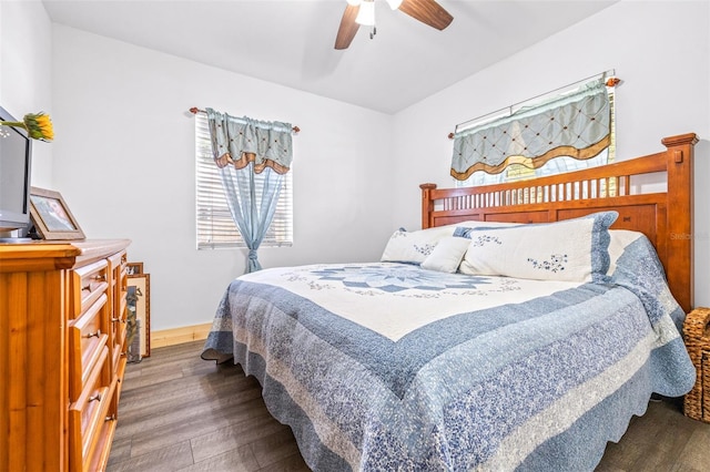 bedroom featuring a ceiling fan and wood finished floors