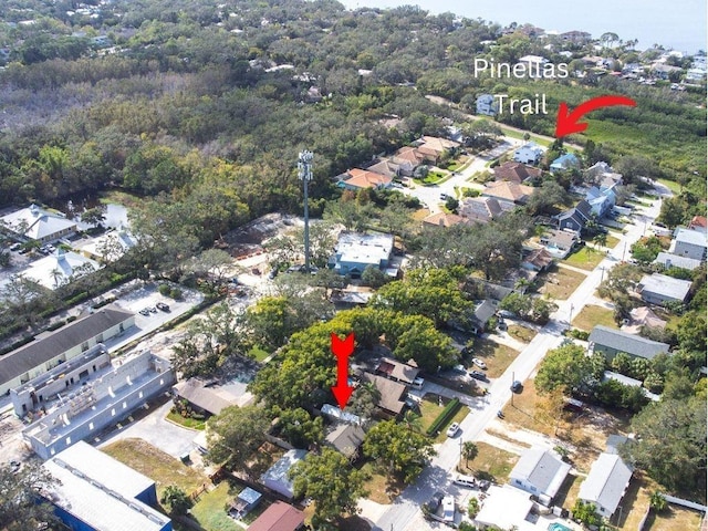 birds eye view of property with a residential view