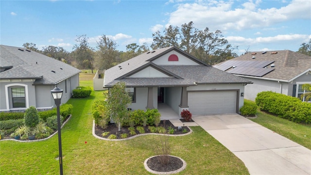 view of front of property featuring a garage, a shingled roof, concrete driveway, a front lawn, and stucco siding