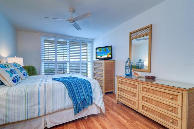 bedroom featuring a ceiling fan and light wood-style flooring