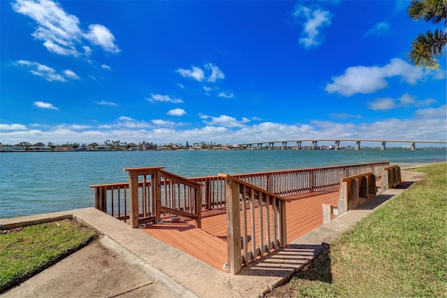 dock area with a water view