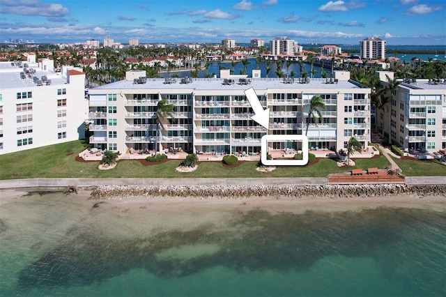 aerial view featuring a city view and a water view