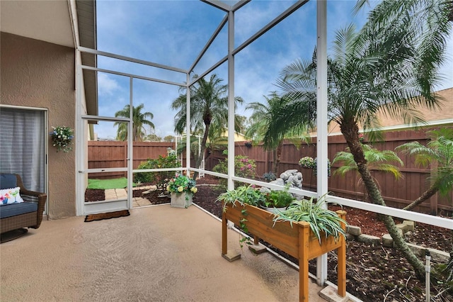 sunroom / solarium featuring a healthy amount of sunlight