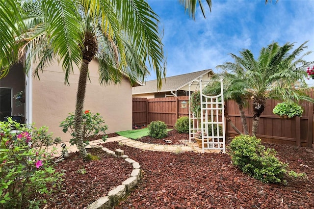 view of yard featuring fence