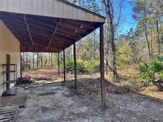 view of yard with a carport