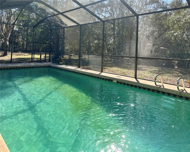 pool featuring glass enclosure