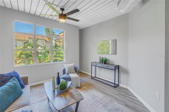 2402 W Azeele St Unit 423, Tampa, FL 33609 - living area with a ceiling fan, wood finished floors, and wooden ceiling