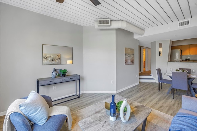 2402 W Azeele St Unit 423, Tampa, FL 33609 - living room with light wood-style flooring, wooden ceiling, and a ceiling fan