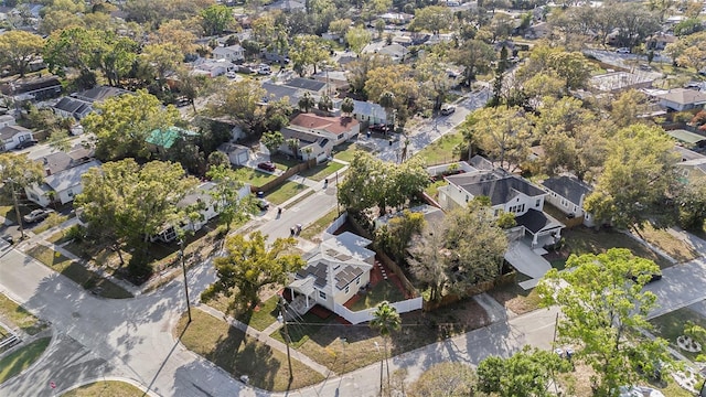 birds eye view of property with a residential view