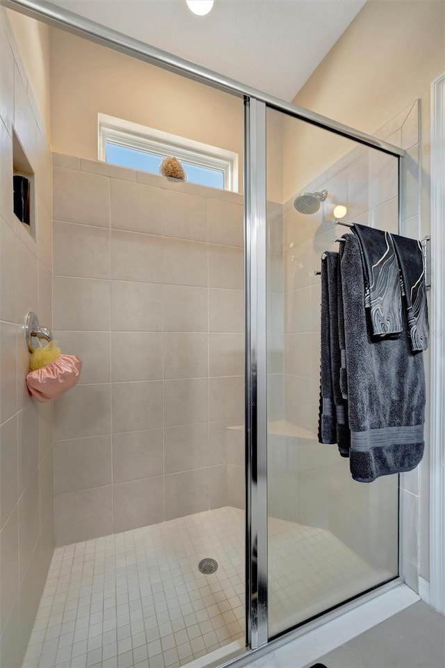 full bathroom with a shower stall