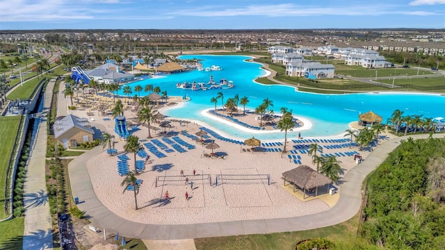 birds eye view of property with a water view