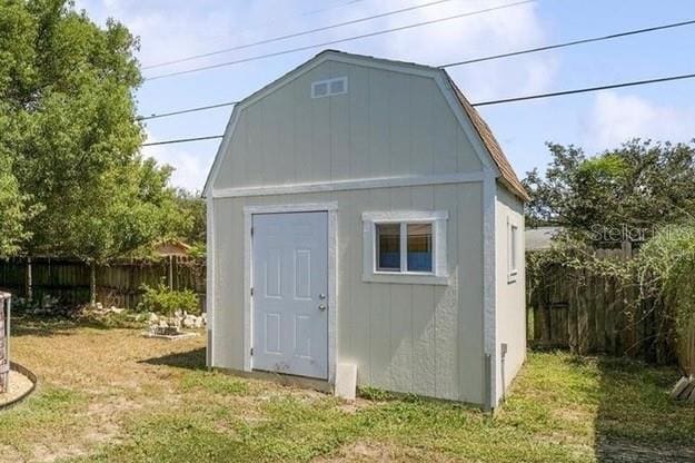 view of shed featuring a fenced backyard