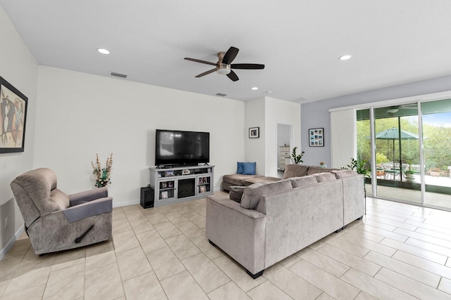 living room featuring light tile patterned floors, a ceiling fan, visible vents, baseboards, and recessed lighting