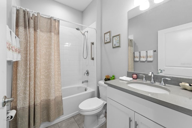 full bathroom with vanity, tile patterned floors, shower / tub combo, and toilet