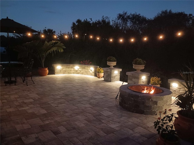 view of patio at night