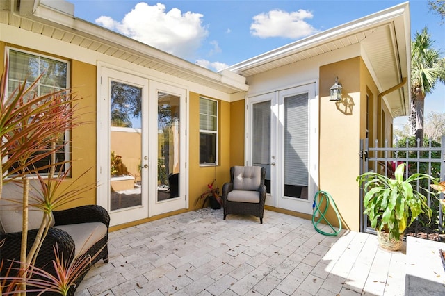 view of patio featuring french doors