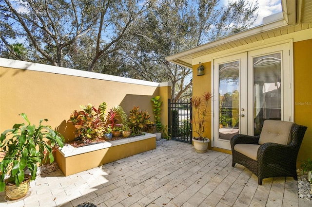 view of patio / terrace featuring a gate