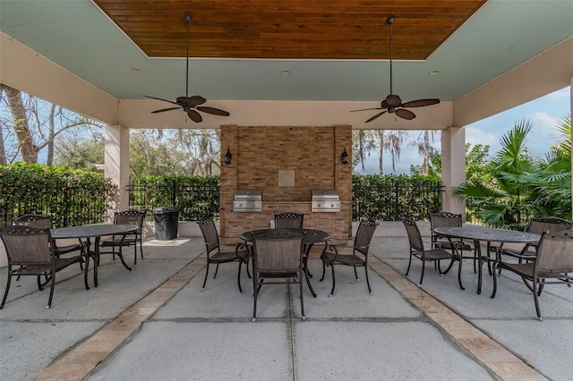 view of patio featuring area for grilling, outdoor dining space, and grilling area