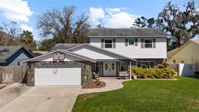 view of front of home featuring stone siding, fence, and a front lawn