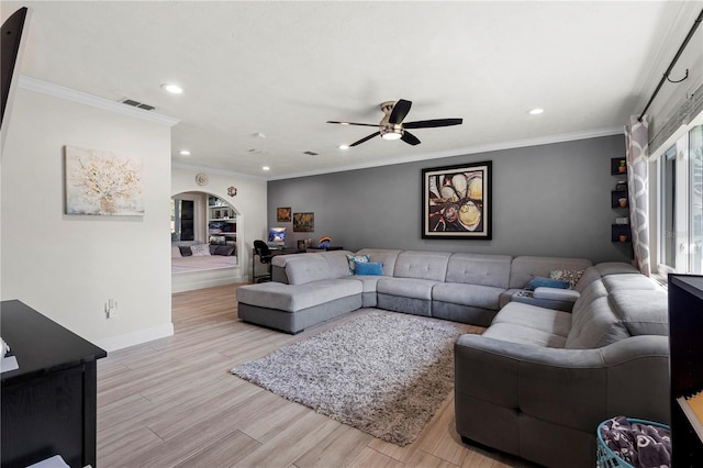 living room with recessed lighting, visible vents, baseboards, ornamental molding, and light wood finished floors