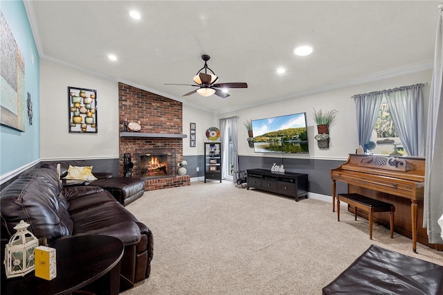 living area featuring ornamental molding, lofted ceiling, a fireplace, and carpet floors