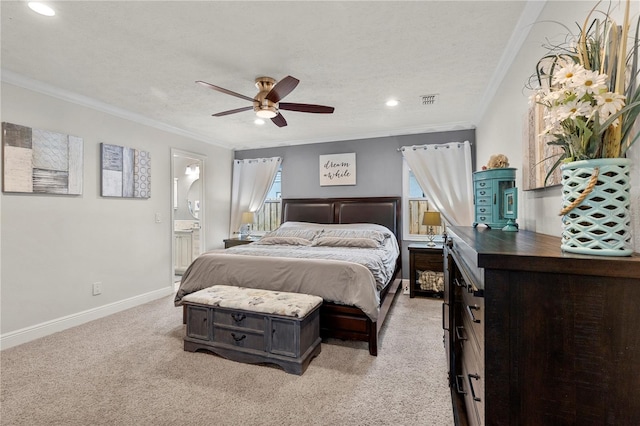 bedroom with ornamental molding, visible vents, light carpet, and baseboards