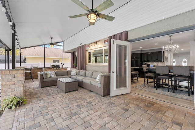 view of patio featuring outdoor dining space, ceiling fan, an outdoor hangout area, and area for grilling