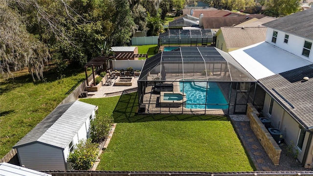 view of pool with a fenced in pool, a patio, a lawn, a lanai, and a fenced backyard