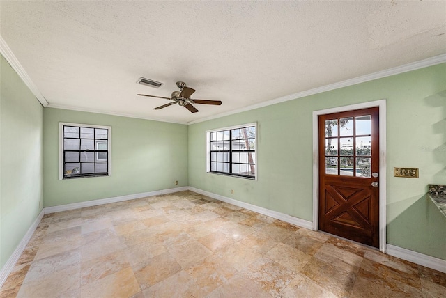 interior space with plenty of natural light, visible vents, baseboards, and ornamental molding