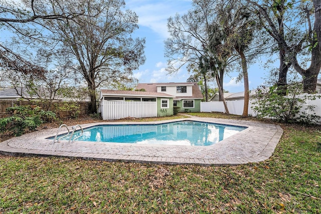 view of pool featuring a fenced backyard, a fenced in pool, and a yard