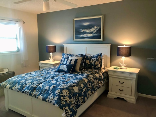 bedroom with carpet and a ceiling fan