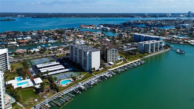 bird's eye view featuring a water view and a city view