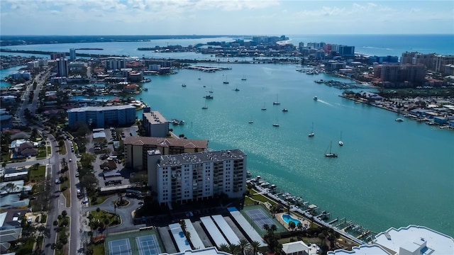 birds eye view of property featuring a view of city and a water view