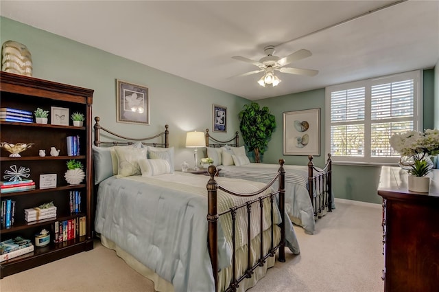 bedroom featuring carpet, ceiling fan, and baseboards