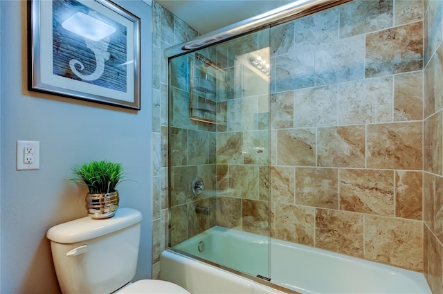 full bathroom featuring toilet and enclosed tub / shower combo