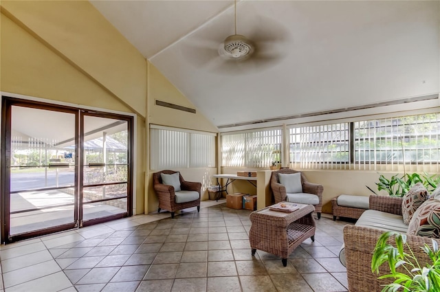 sunroom with vaulted ceiling and a ceiling fan