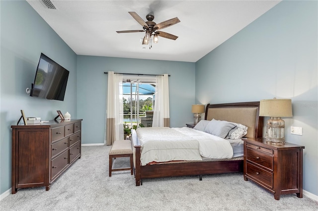 bedroom featuring access to outside, light colored carpet, visible vents, and baseboards