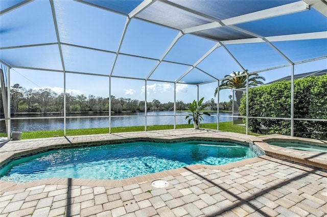 view of swimming pool featuring a lanai, a patio area, and a water view