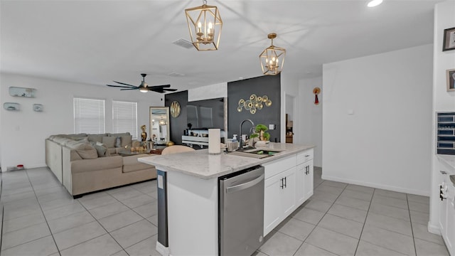 kitchen with visible vents, white cabinets, dishwasher, a sink, and ceiling fan with notable chandelier