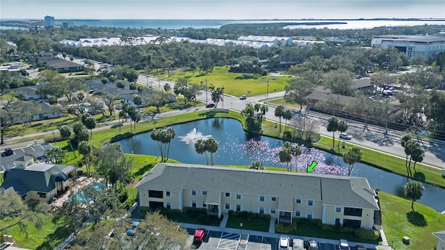 bird's eye view with a residential view and a water view