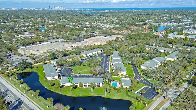 drone / aerial view featuring a residential view and a water view