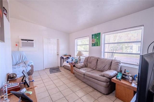 1800 27th Ave N, Saint Petersburg, FL 33713 - living room featuring lofted ceiling, light tile patterned floors, and a wall mounted AC