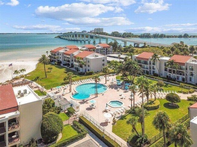 birds eye view of property featuring a water view