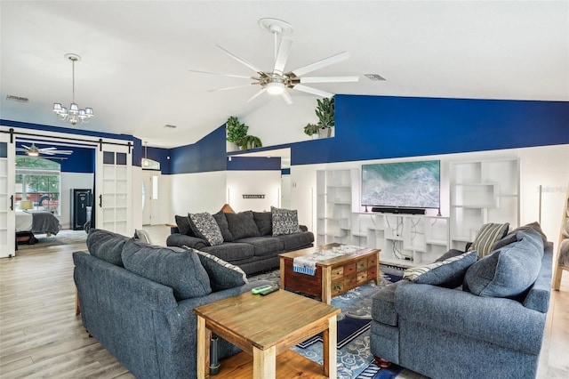 living room with high vaulted ceiling, visible vents, wood finished floors, and ceiling fan with notable chandelier