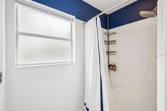 full bathroom with a shower with shower curtain