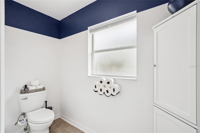 13 Witch Hazel Ct, Homosassa, FL 34446 - bathroom featuring baseboards, toilet, and tile patterned flooring
